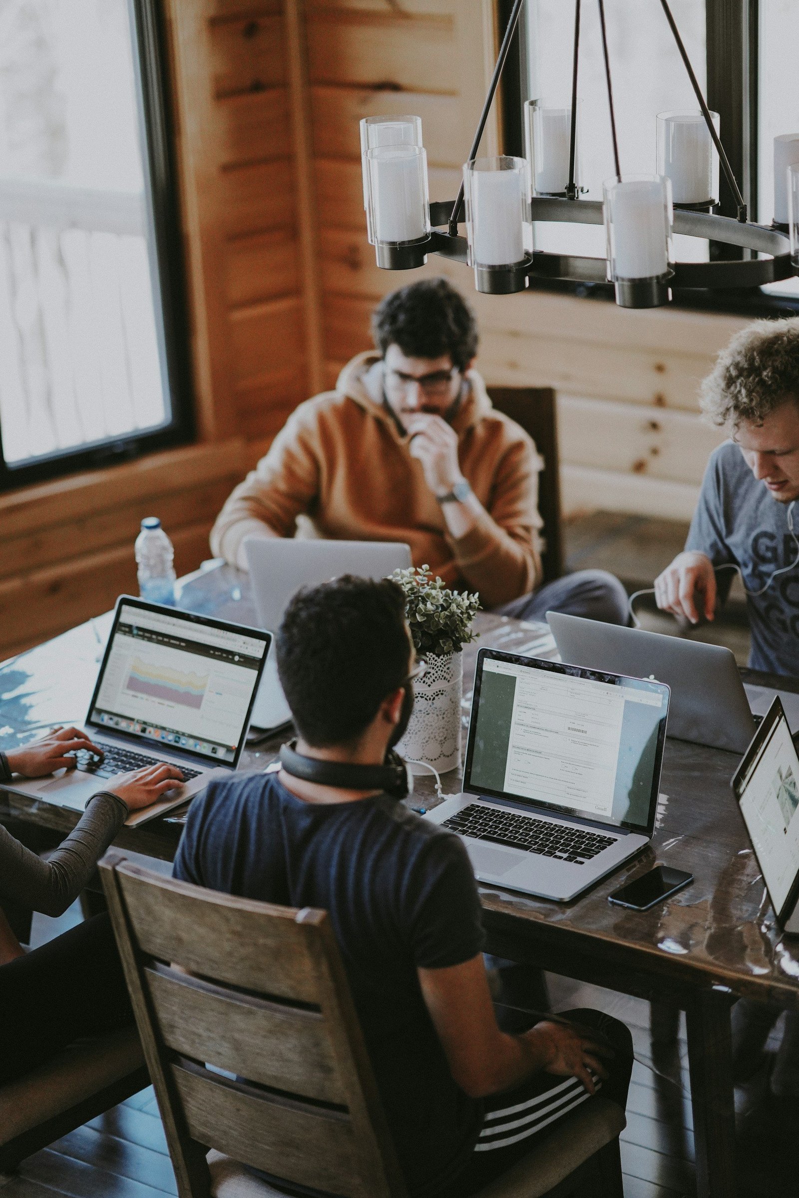 Professionals collaborating in a bright workspace